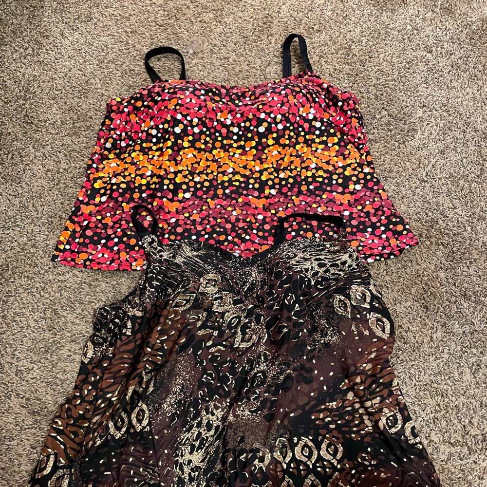 Swim tank tops only. 2 included. Built in bras